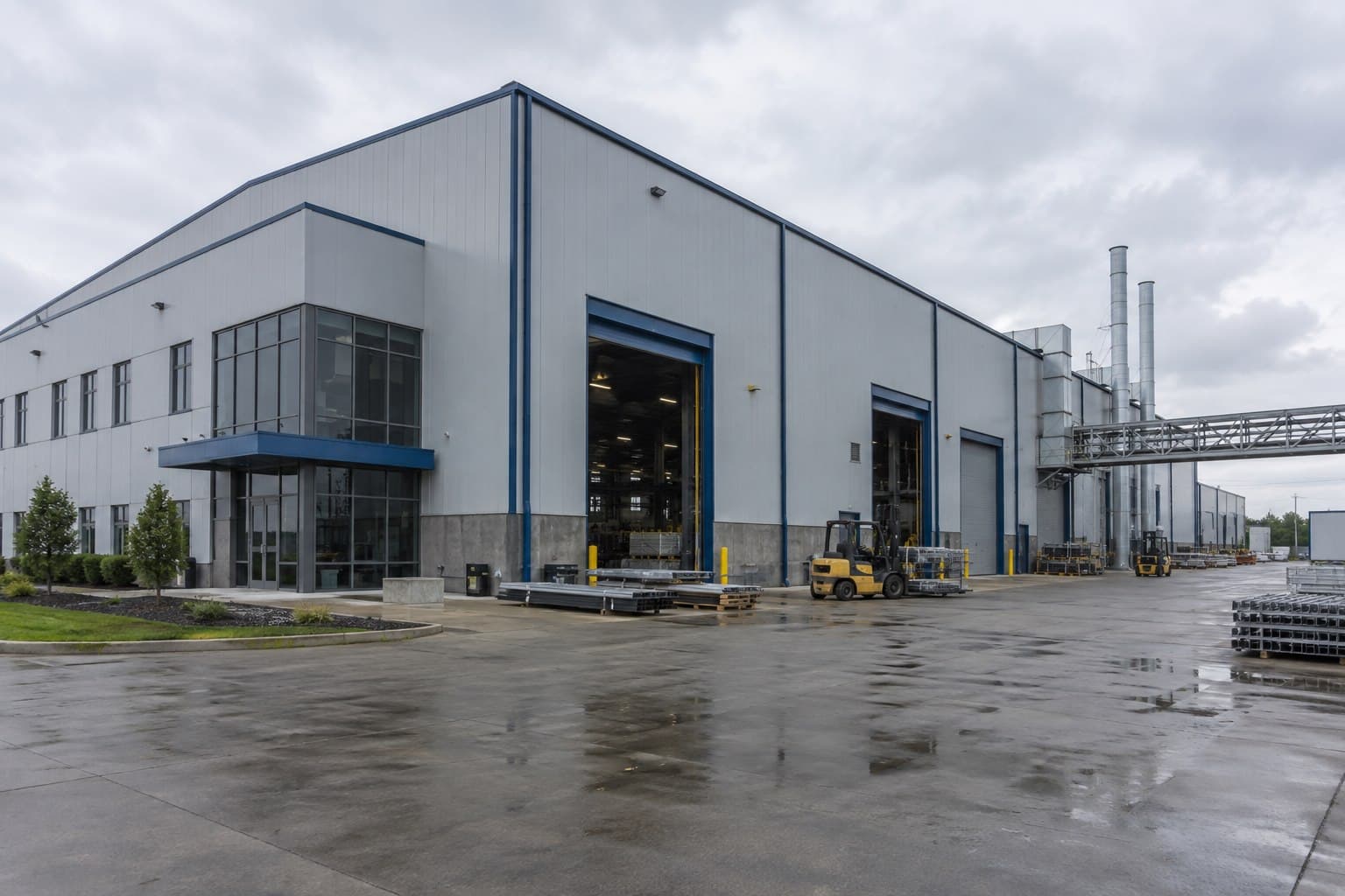 Operating industrial steel factory building with production equipment